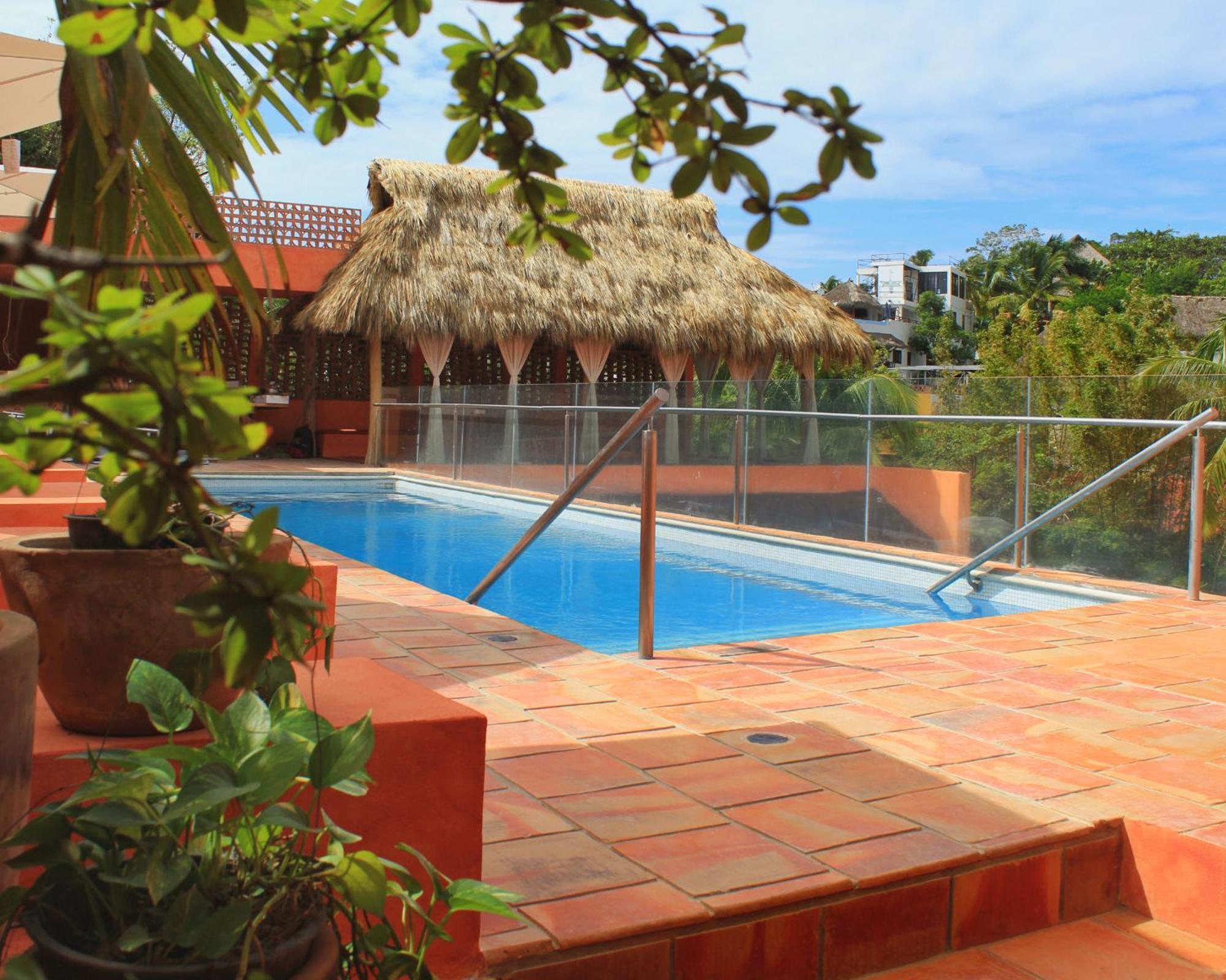 Casa Pepe Hotel Саюлита Екстериор снимка Rooftop pool at Hotel Xel-Há